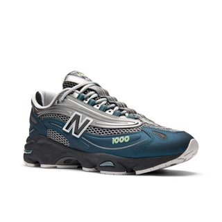 New Balance 1000 in Deep Ocean with Dark Silver Metallic accents and ABZORB cushioning.