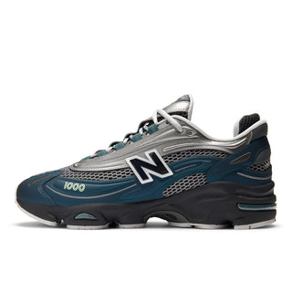 New Balance 1000 in Deep Ocean with Dark Silver Metallic accents and ABZORB cushioning.