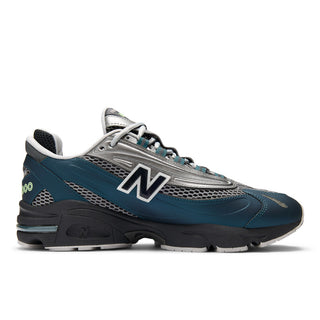 New Balance 1000 in Deep Ocean with Dark Silver Metallic accents and ABZORB cushioning.