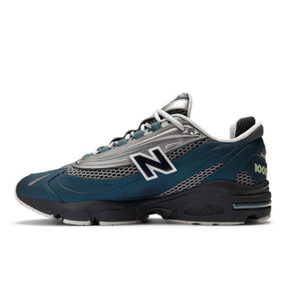 New Balance 1000 in Deep Ocean with Dark Silver Metallic accents and ABZORB cushioning.