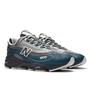 New Balance 1000 in Deep Ocean with Dark Silver Metallic accents and ABZORB cushioning.