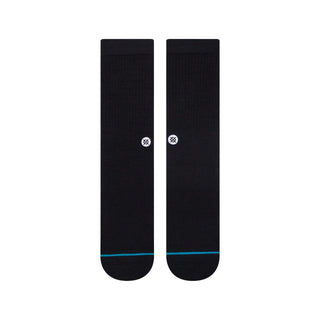 Black and white Stance Icon Crew Socks with medium cushioning and seamless toe for comfort.
