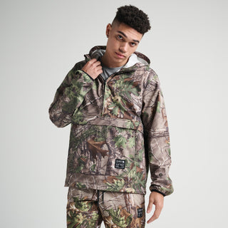 Realtree X Stance Complex Anorak in camo, designed with a midweight polyester blend and infused with FreshTek™ and FEEL360™ technologies. Regular fit, lightweight, ultra-durable and features a fluid four-way stretch construction.