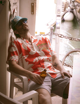 Duvin x Margaritaville Beach Club Buttonup short sleeve shirt in Red, relaxed fit classic camp collar with front chest pocket, 88% Tencel 12% Linen blend, lightweight breathable fabric made to be worn untucked, coastal lifestyle collaboration shirt