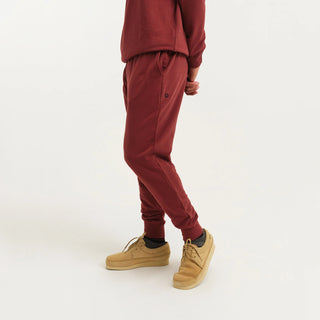 A pair of Stance Burgundy Shelter Joggers made with ultra-soft Butter Blend™ fabric for ultimate comfort.