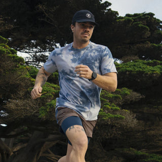 Roark Mathis Active Tie Dye Pocket Short Sleeve Tee in Neptune, classic crewneck fit in 85% recycled polyester 15% cotton DriRelease jersey knit with chest pocket, quick-dry technology, interior hanger loop, and Neptune tie dye colorway