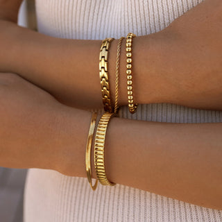 ALCO Seaside Stretch bracelet in 18K gold-plated stainless steel with comfortable stretch design for effortless coastal style.