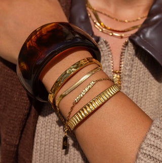 ALCO Sloan bracelet in 18K gold-plated stainless steel with lobster clasp, 6 inch length, and 2 inch extender.