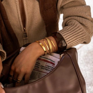 ALCO Sloan bracelet in 18K gold-plated stainless steel with lobster clasp, 6 inch length, and 2 inch extender.