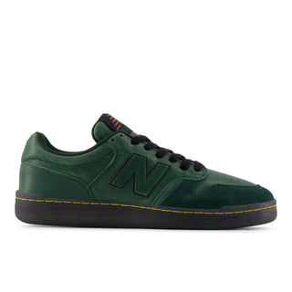 Green New Balance Numeric 480 skate shoe with suede, leather, and mesh upper.