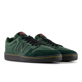 Green New Balance Numeric 480 skate shoe with suede, leather, and mesh upper.