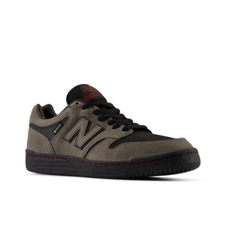 Side view of the New Balance Numeric 480 Gore-Tex shoe with grey panels, black laces, black outsole, and an N logo