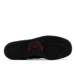 Side view of the New Balance Numeric 480 Gore-Tex shoe with grey panels, black laces, black outsole, and an N logo