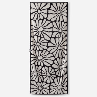 Nomadix Organic Cotton Beach Towel in Lazy Daisy Black — plush, absorbent, Fair Trade Certified™, 100% organic cotton, 30" x 72.5"