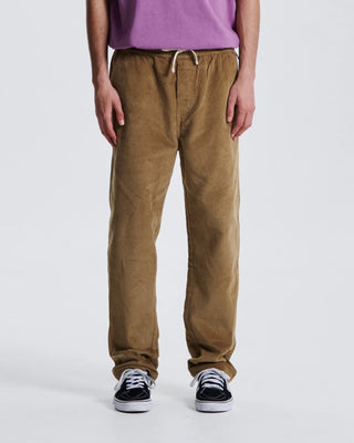 Critical Slide Fever Cord Pant in Camel with relaxed straight fit and elastic waist, made from heavy 8-wale corduroy.