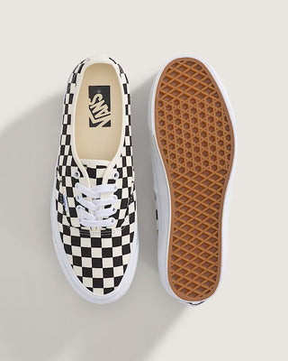 Vans LX Authentic Reissue 44 checkerboard sneaker with black and white pattern and low-top silhouette.