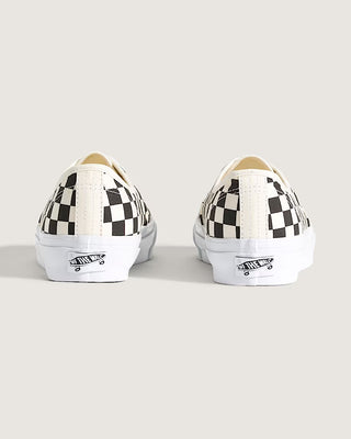 Vans LX Authentic Reissue 44 checkerboard sneaker with black and white pattern and low-top silhouette.