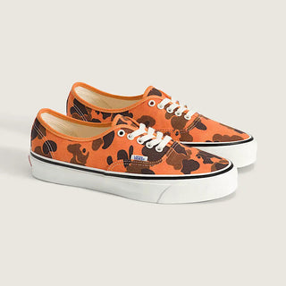 Vans LX Authentic shoes in Duck Camo Orange with lightweight canvas upper, higher sidewall with gloss finish, Sola Foam ADC insole, signature waffle outsole, and vulcanized build
