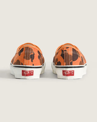 Vans LX Authentic shoes in Duck Camo Orange with lightweight canvas upper, higher sidewall with gloss finish, Sola Foam ADC insole, signature waffle outsole, and vulcanized build