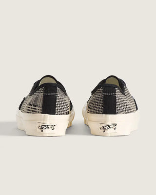 Vans LX Authentic 44 in Herringbone Black/Tan — herringbone-textured suede and canvas upper, vulcanized build, Sola Foam ADC insole, waffle outsole