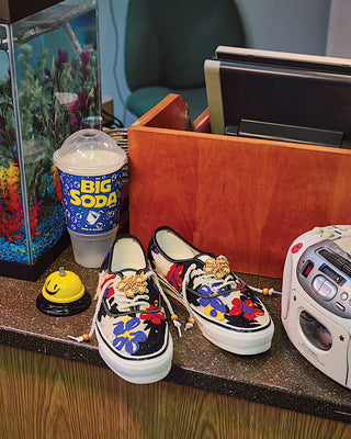 Vans LX Authentic 44 EK Needlework sneaker with floral embroidery, canvas upper, and low-top silhouette with lace details.