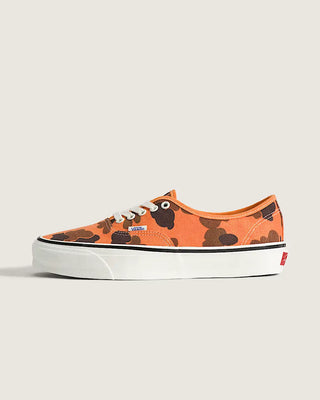 Vans LX Authentic shoes in Duck Camo Orange with lightweight canvas upper, higher sidewall with gloss finish, Sola Foam ADC insole, signature waffle outsole, and vulcanized build