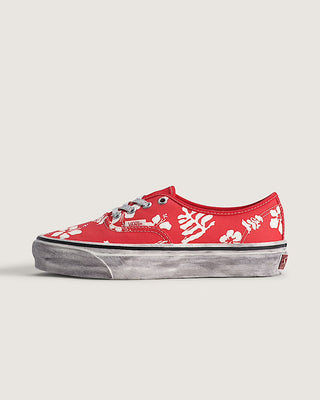 Vans LX Authentic 44 Archive Red sneaker with bright red canvas upper and classic low-top silhouette.

