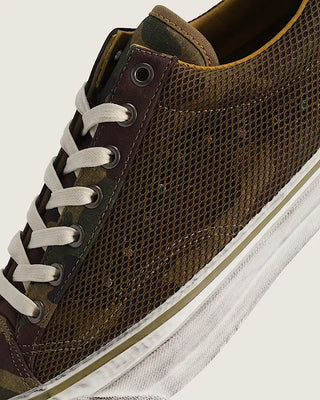 Vans LX Premium Old Skool 36 in Woodland Camo Green with canvas upper and studded Sidestripe gillnet overlay.