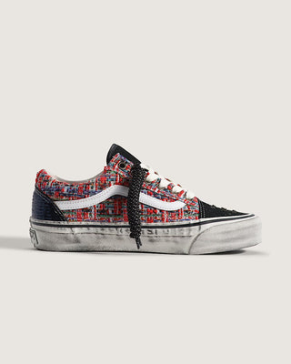 Vans LX Old Skool Charms Red Black sneaker with textured tweed upper, splatter design, and metal charm detail.