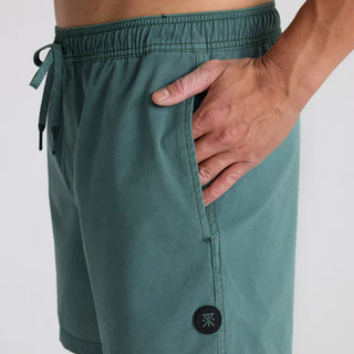 Roark Shorey Trunks in Sage Green with elastic waistband and water-resistant stretch fabric.