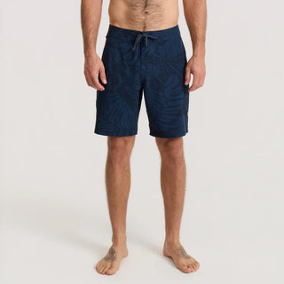Roark Men's Passage Pro Boardshorts in Navy — durable nylon four-way stretch with 18.5" outseam, flat felled seams, and water-resistant finish for long days on the water.
