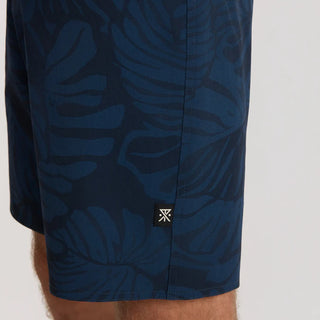 Roark Men's Passage Pro Boardshorts in Navy — durable nylon four-way stretch with 18.5" outseam, flat felled seams, and water-resistant finish for long days on the water.
