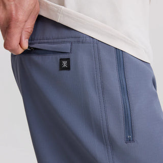 Roark Venture Boardshorts in Neptune, standard fit 90% recycled polyester 10% spandex 4-way stretch ripstop boardshorts with C0 DWR water-resistant finish, 18.5 inch outseam, 8.5 inch inseam, flat-felled seams, and zip front and back pockets