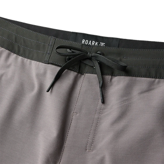 Roark Chiller Scallop Boardshorts in Shark, standard fit GRS certified recycled polyester 4-way stretch boardshorts with C0 DWR water-resistant finish, 17 inch outseam, flat-felled seams, hand pockets, cell stash back pocket, and fully encased drawstring waistband