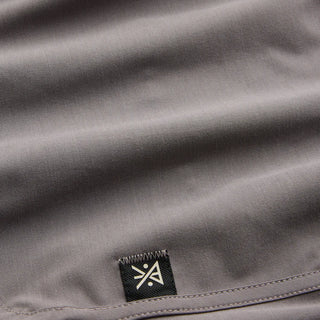 Roark Chiller Scallop Boardshorts in Shark, standard fit GRS certified recycled polyester 4-way stretch boardshorts with C0 DWR water-resistant finish, 17 inch outseam, flat-felled seams, hand pockets, cell stash back pocket, and fully encased drawstring waistband