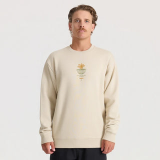 Roark Enjoy Globe Crew sweatshirt in Sand with a small centered flower-and-globe graphic, crew neckline, and ribbed cuffs and hem