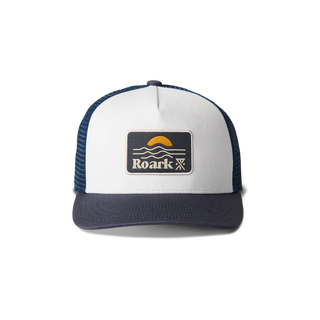 Roark Station Trucker Hat in White/Navy with mesh back and skull patch