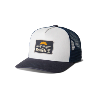 Roark Station Trucker Hat in White/Navy with mesh back and skull patch