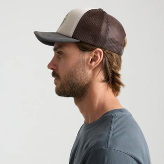 Roark Foam Trucker Global Snapback Hat in Military, structured 5-panel foam front trucker hat in 100% polyester with slightly curved visor, polyester mesh back, snapback closure, contrast visor and mesh color, and satin stitch chain stitch embroidery