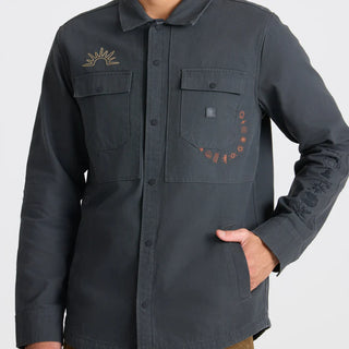 Roark Hebrides Unlined Jacket in Onyx with embroidered sun and flower patches.