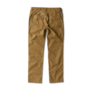 Roark Layover Pro Traveler Pants in Dark Khaki, straight-leg 4-way stretch Embarq Dura-Stretch fabric with TSA-friendly waistband, zippered travel pockets, back phone stash pocket, and laser-perforated cooling panel