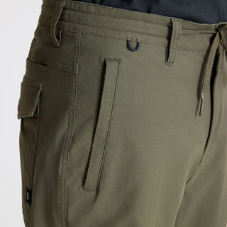 Roark Layover Pro Pants in Military green with stretch fabric and travel-ready features.