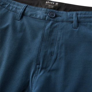 Roark Hytide Hybrid Shorts in Navy, versatile quick-dry hybrid shorts in 52% recycled polyester 26% polyester 15% cotton 7% elastane with 18.5 inch outseam, moisture-wicking fabric, drawstring waistband, back zip pockets, and Roark signature drop pocket