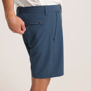 Roark Hytide Hybrid Shorts in Navy, versatile quick-dry hybrid shorts in 52% recycled polyester 26% polyester 15% cotton 7% elastane with 18.5 inch outseam, moisture-wicking fabric, drawstring waistband, back zip pockets, and Roark signature drop pocket
