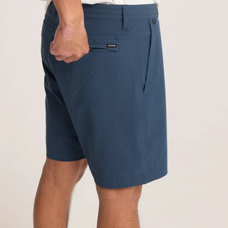 Roark Hytide Hybrid Shorts in Navy, versatile quick-dry hybrid shorts in 52% recycled polyester 26% polyester 15% cotton 7% elastane with 18.5 inch outseam, moisture-wicking fabric, drawstring waistband, back zip pockets, and Roark signature drop pocket