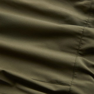 Roark Serrano 7 inch Active Stretch Shorts in Military, athletic fit lightweight REPREVE recycled polyester shorts with DWR water-resistant finish, side zip pocket, dual slash pockets, and rear YKK zip pocket