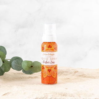 Mixologie Amber Sun 100 mL Luxe Room Spray, featuring warm amber and bright sunshine scents.