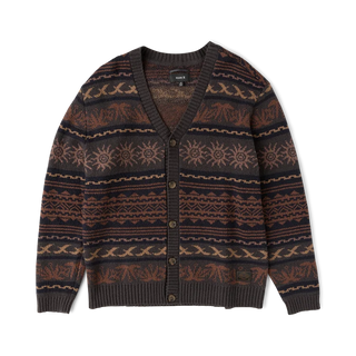 Roark Nomad Cardigan in Rust with horizontal geometric and sun motifs, a V-neck, button-front closure, and dark ribbed trim