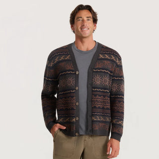 Roark Nomad Cardigan in Rust with horizontal geometric and sun motifs, a V-neck, button-front closure, and dark ribbed trim