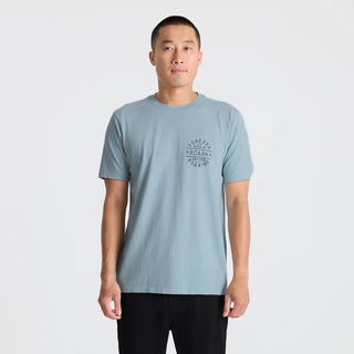 Roark Stamp Premium Tee in Dusty Blue with back graphic and premium fit.